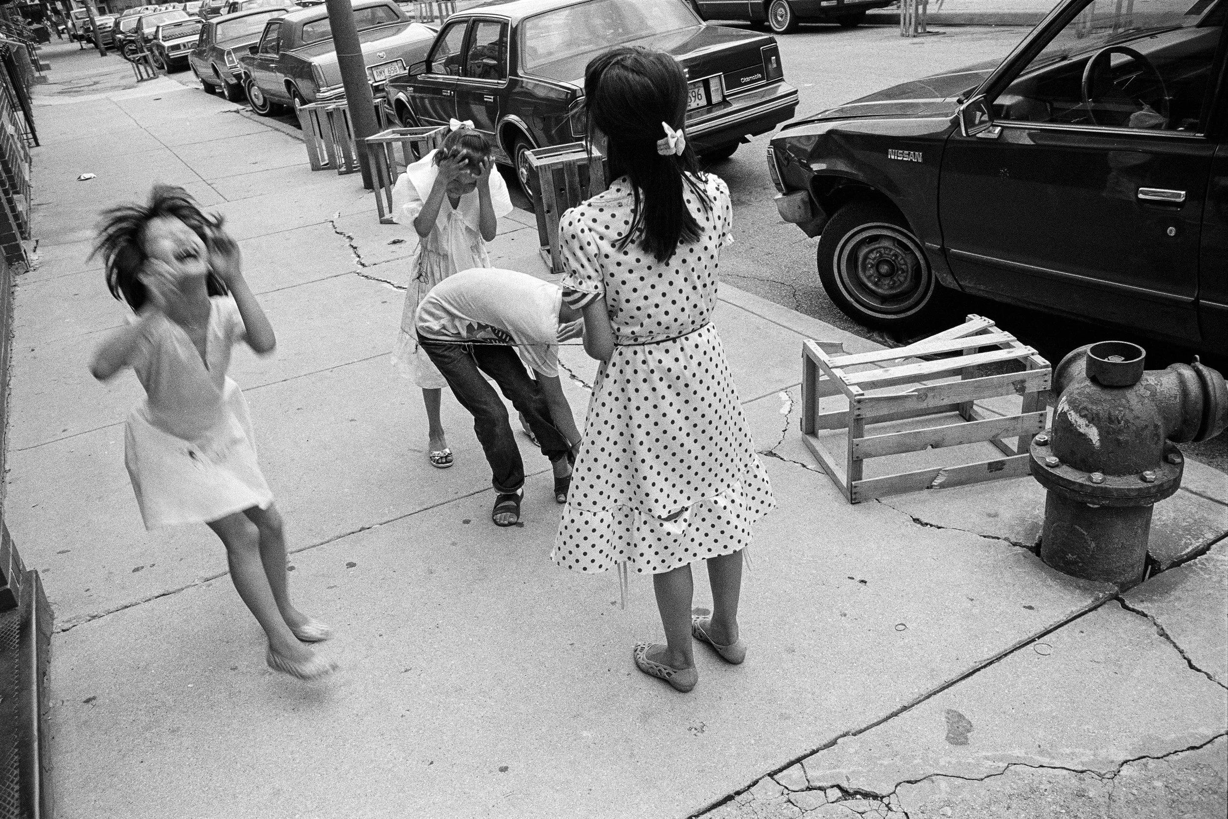  Chicago, 1987.  Kids in Chinatown play Chinese jump rope 