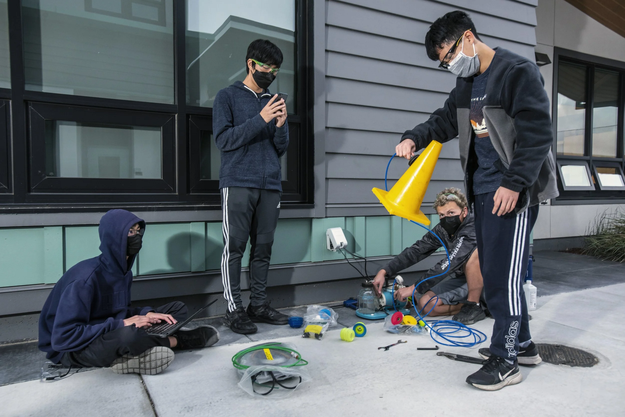  Mountain View, 2023.  Members of the Mountain View High School 971 Spartan Robotics Team prototype a suction subsystem for picking up cones.  This was ultimately passed over for a silicone roller based method.  Failure and re-grouping as a team is a