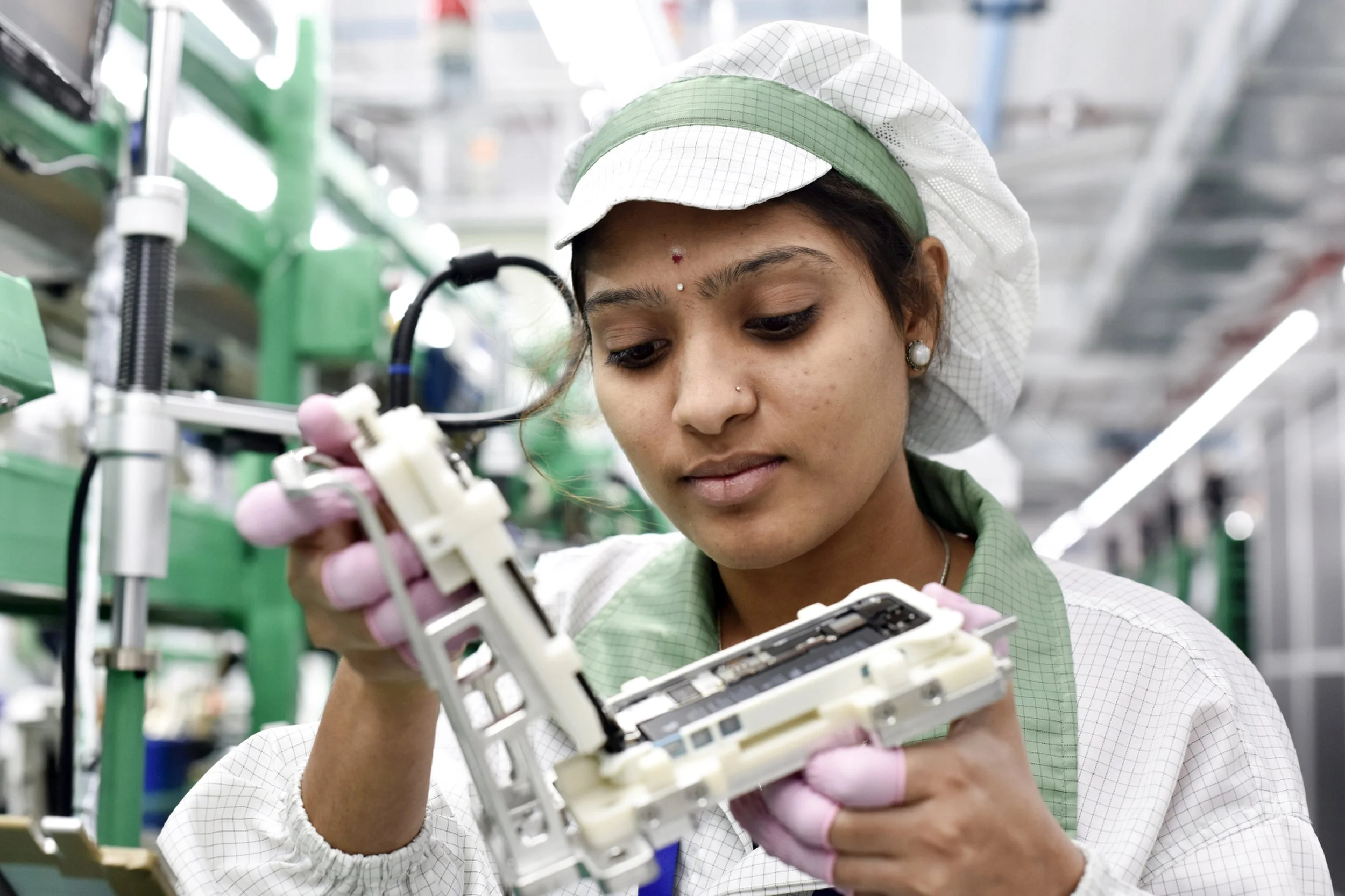  Apple.  iPhone assembly worker.  Bengaluru, India 