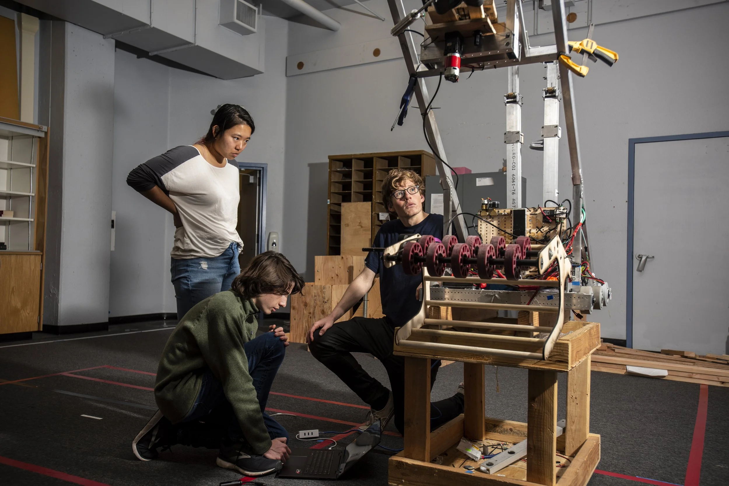   Bay Area High School STEM Competitors.  Berkeley, 2023. Members of Berkeley High School Team 5419 Berkelium look at a previous prototype for ideas about the new season’s robot 