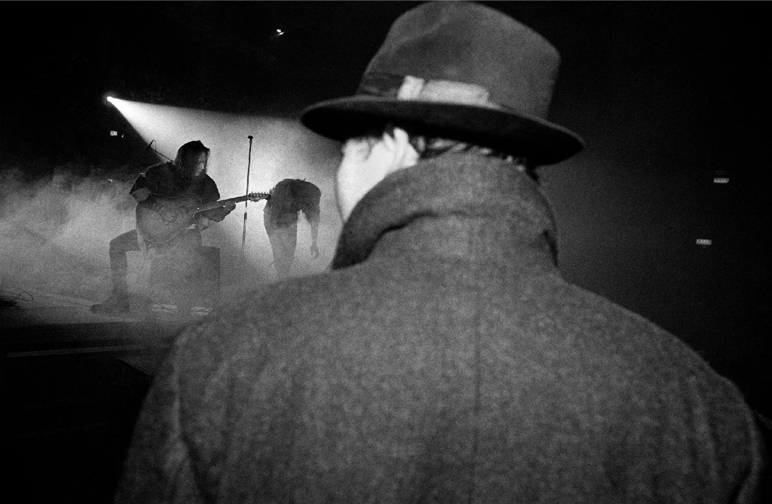   China Obscura . Beijing, 1992. Plainclothes policeman monitors concert by rock band Tang Dynasty 