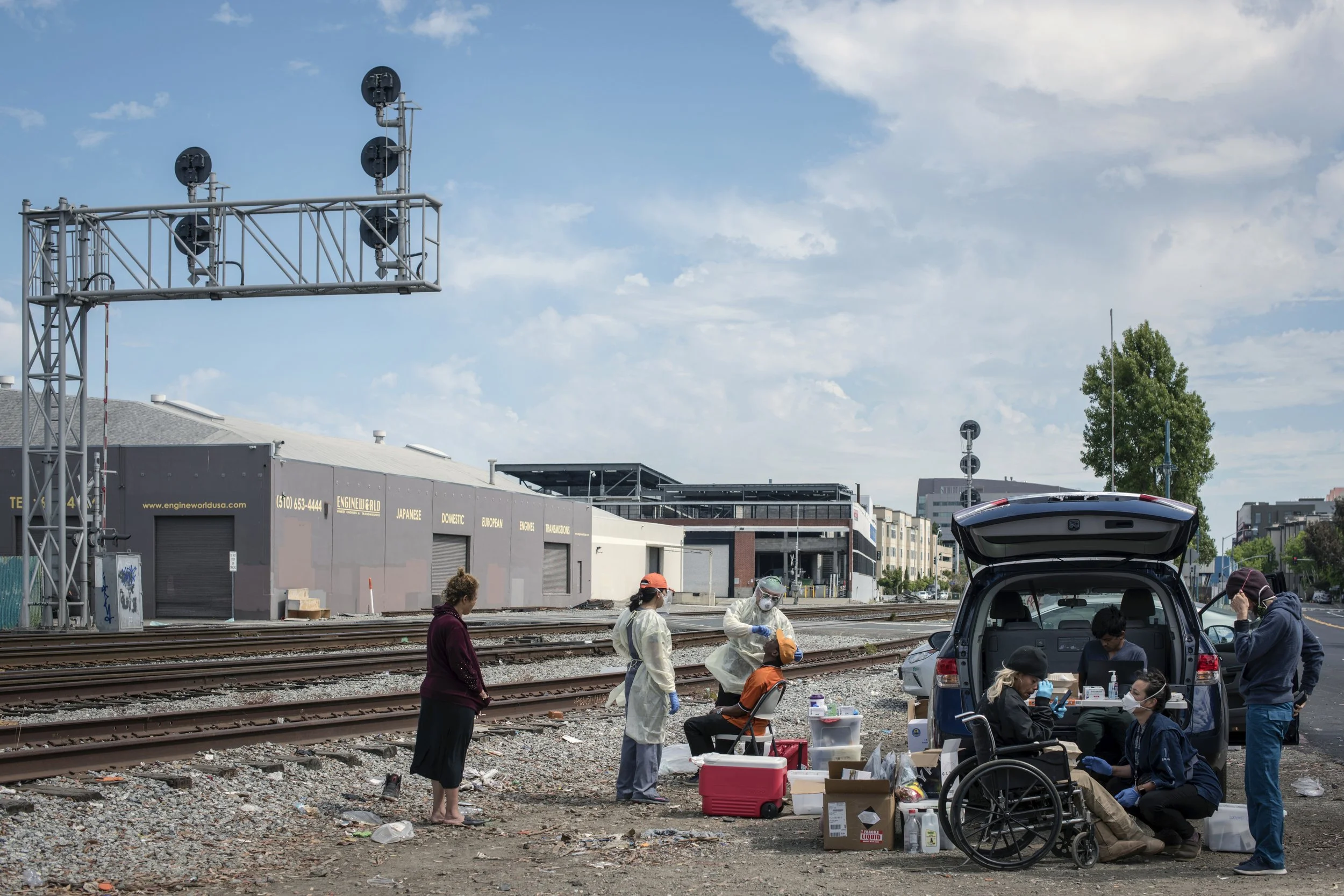   Bay Area Shelter Crisis During Covid . Berkeley, 2020. Lifelong Medical Center Street Medicine Team does testing and other treatment at the Shellmound homeless encampment, where recently a positive case was discovered 