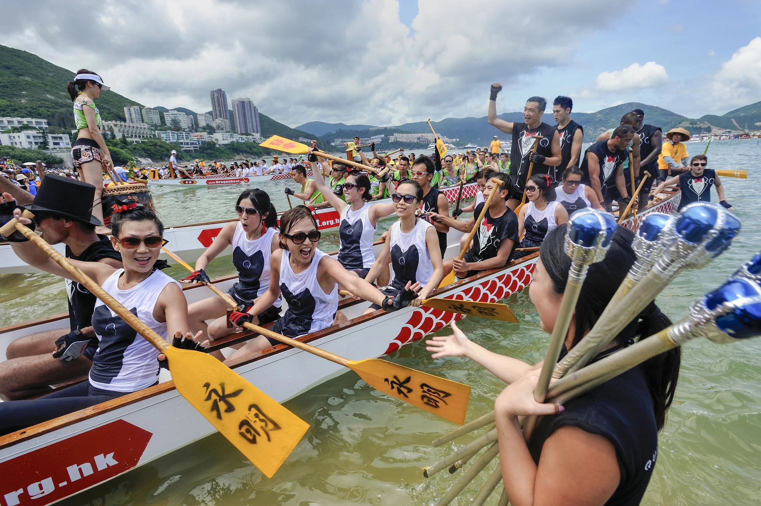  Hong Kong, 2011.  Dragon boat races have become a team-building event for many corporations and institutions who compete in the Stanley Beach paddling heats 