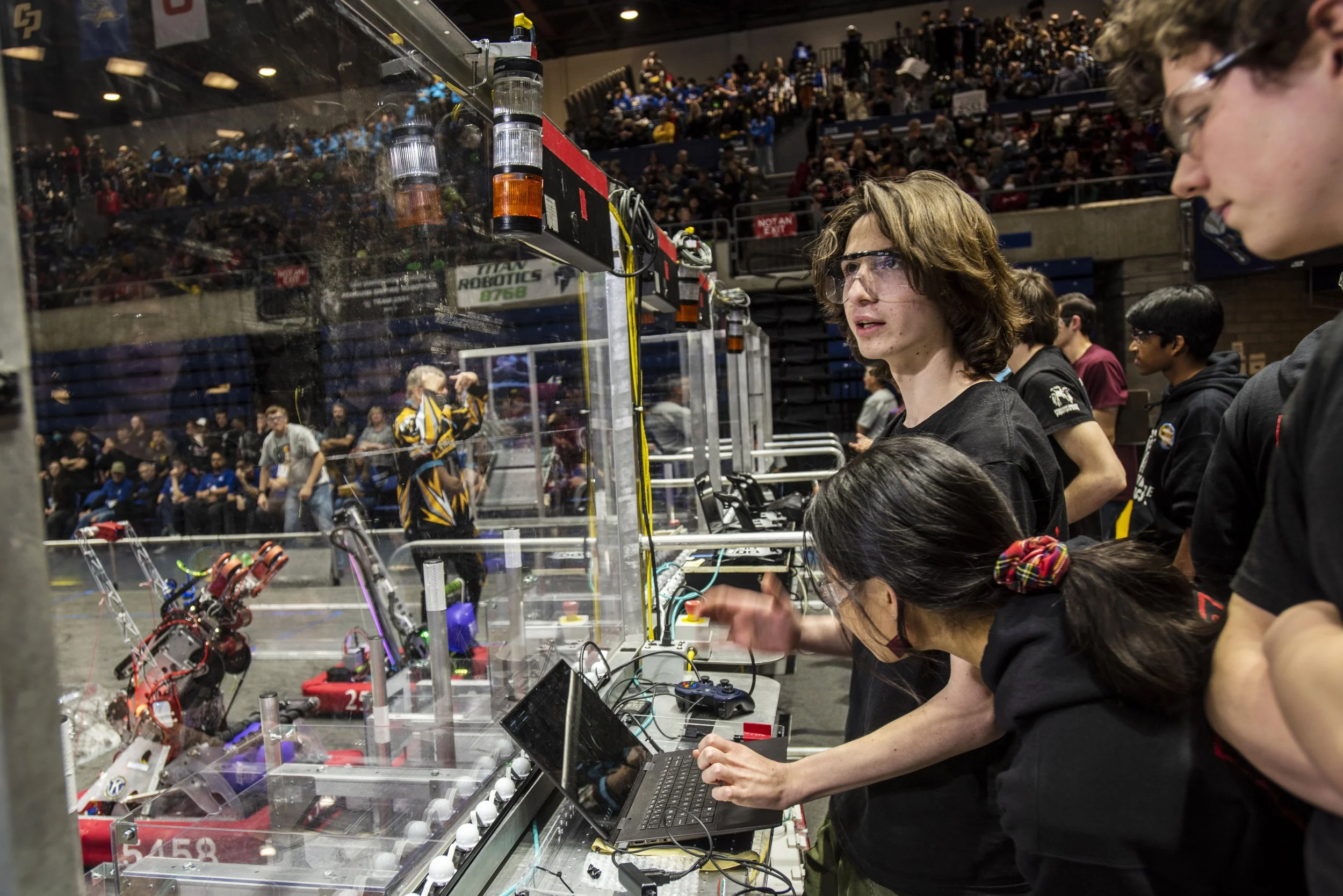  Davis, 2023.  Drivers and coders for Berkeley High School Team 5419 Berkelium calibrate their robot’s vision targeting system before the playoff elimination rounds at the Sacramento Regionals.   