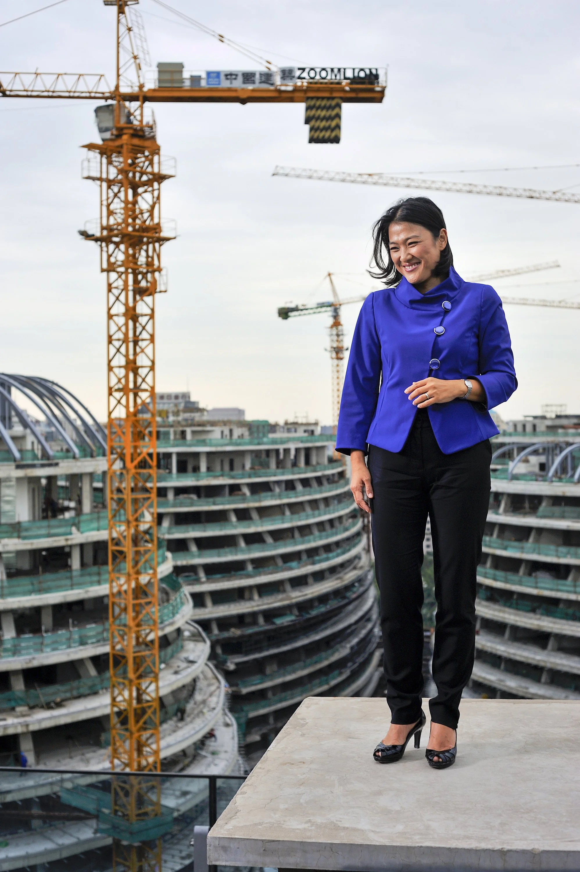  For someone who is as responsible as anyone for Beijing's modern cityscape, with over a dozen projects punctuating the skyline, SOHO China CEO Zhang Xin rarely has the time to get up high and see how her company's work looks from above.  Climbing th
