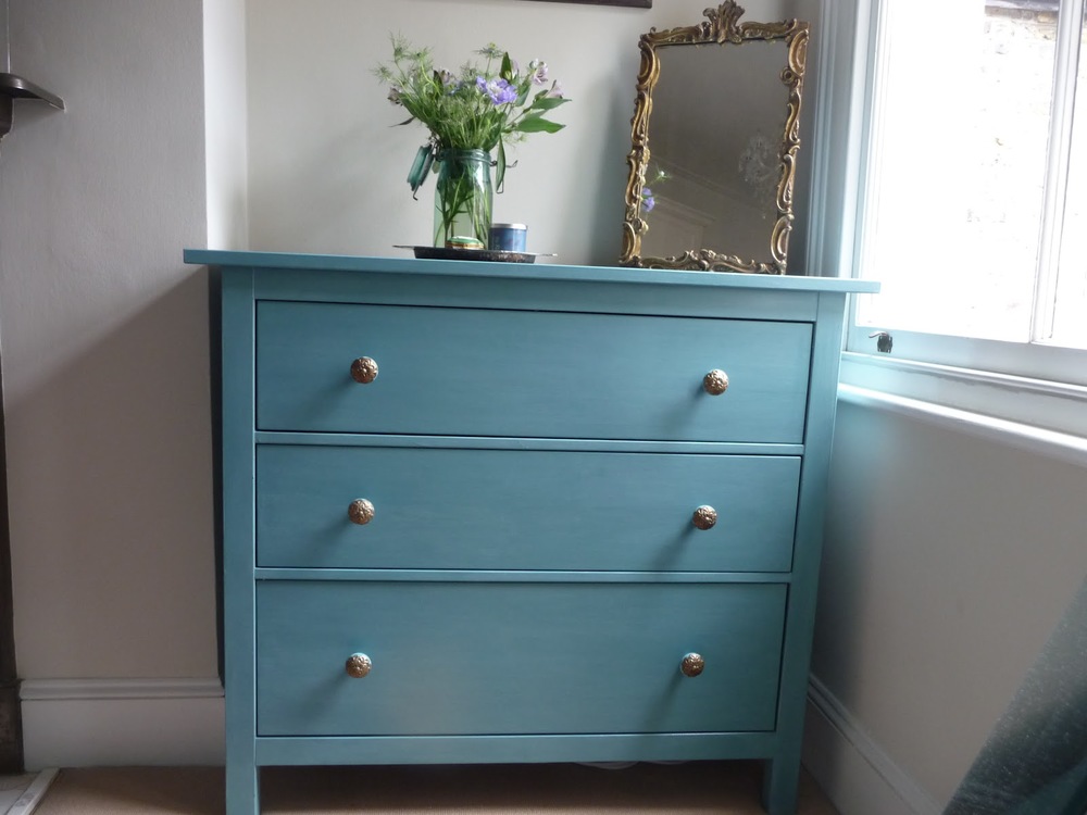 Ikea chest of drawers painted in Provence and inside of drawers painted 'Greek Blue'. Handles are from Anthropologie.