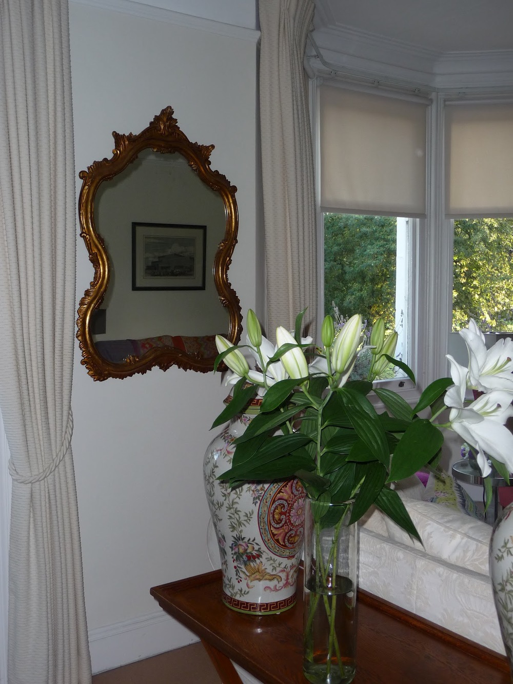 This is my most recent purchase - I bought it for an absolute song in an auction with plans to do some sort of paint effect on it. I loved the shape which is why I bought it. However once hung, I loved it just as it is so I'll not be painting it... for now!