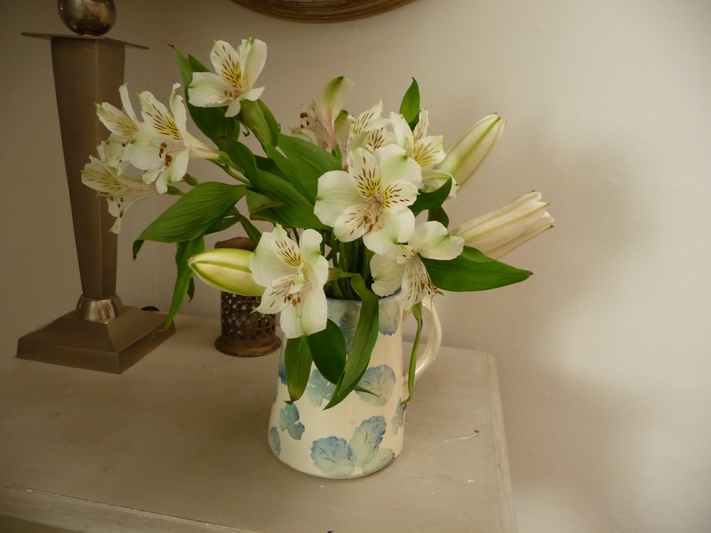 Two-week old Alstromeria and lilies cut down to squeeze another week out of them. The jug was a great charity shop find at £3!