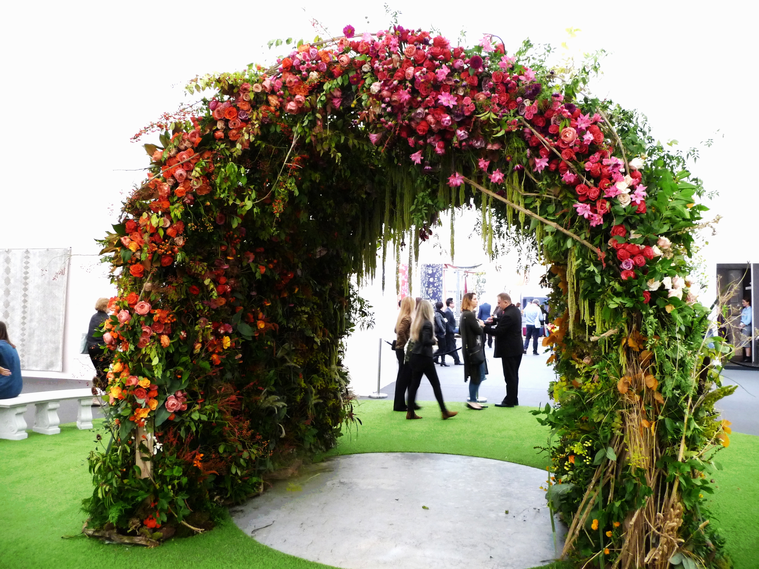 Beautiful archway of flowers in the foyer at Decorex 