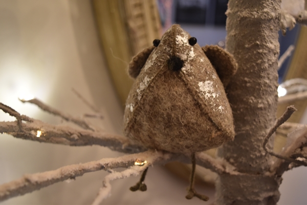  This comical little felt bird is a new addition on this tree from  Petersham Nurseries  