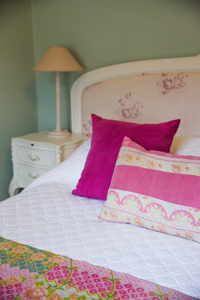  Before the lampshades were just beige linen. Now they are a pleated shade with a funky gold and purple pattern 