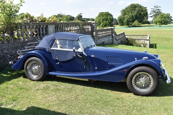  Just had to photograph this gorgeous car parked outside the gate 