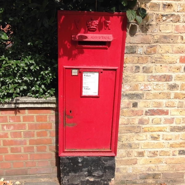  A post box built into the brick wall of one of the houses 