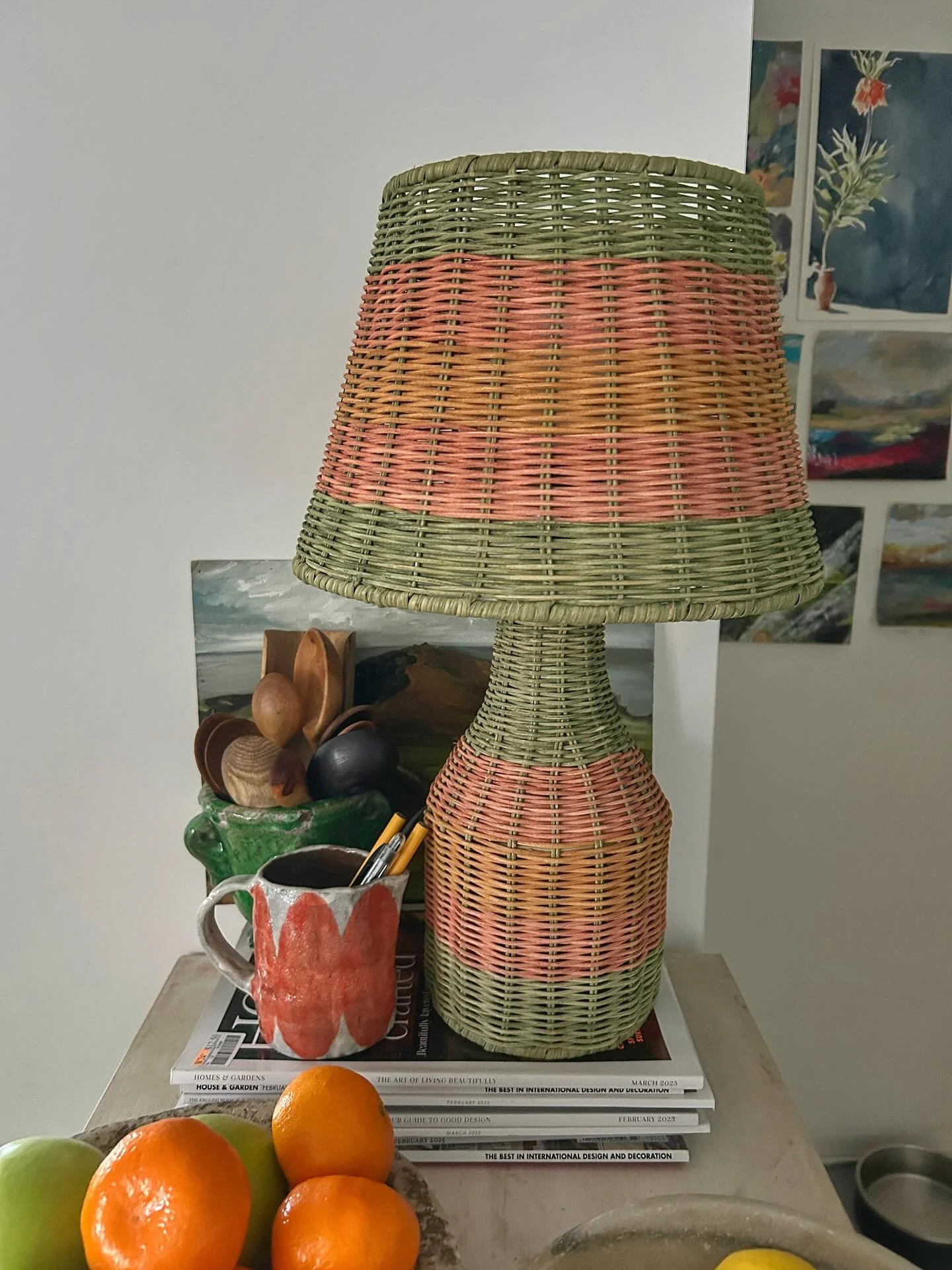 A gorgeous rattan table lamp from @kipandco for my kitchen island. I love the slightly faded, colours which make it seem vintage. We like? ☺️ Swipe right for more images.