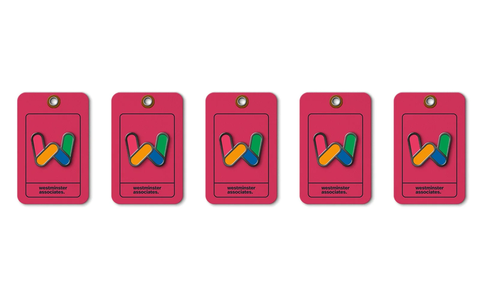 Five bright pink Westminster Associates promotional tags with a stylized 'W' logo in black outline, featuring overlapping colorful sections in orange, green, blue, and yellow.