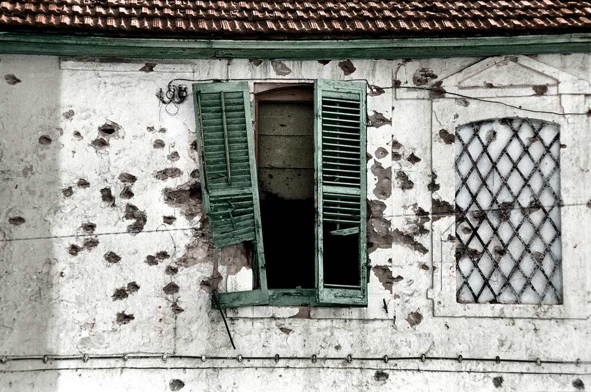 bullet-holes-in-a-facade-cyprus-1974-web (1).jpg