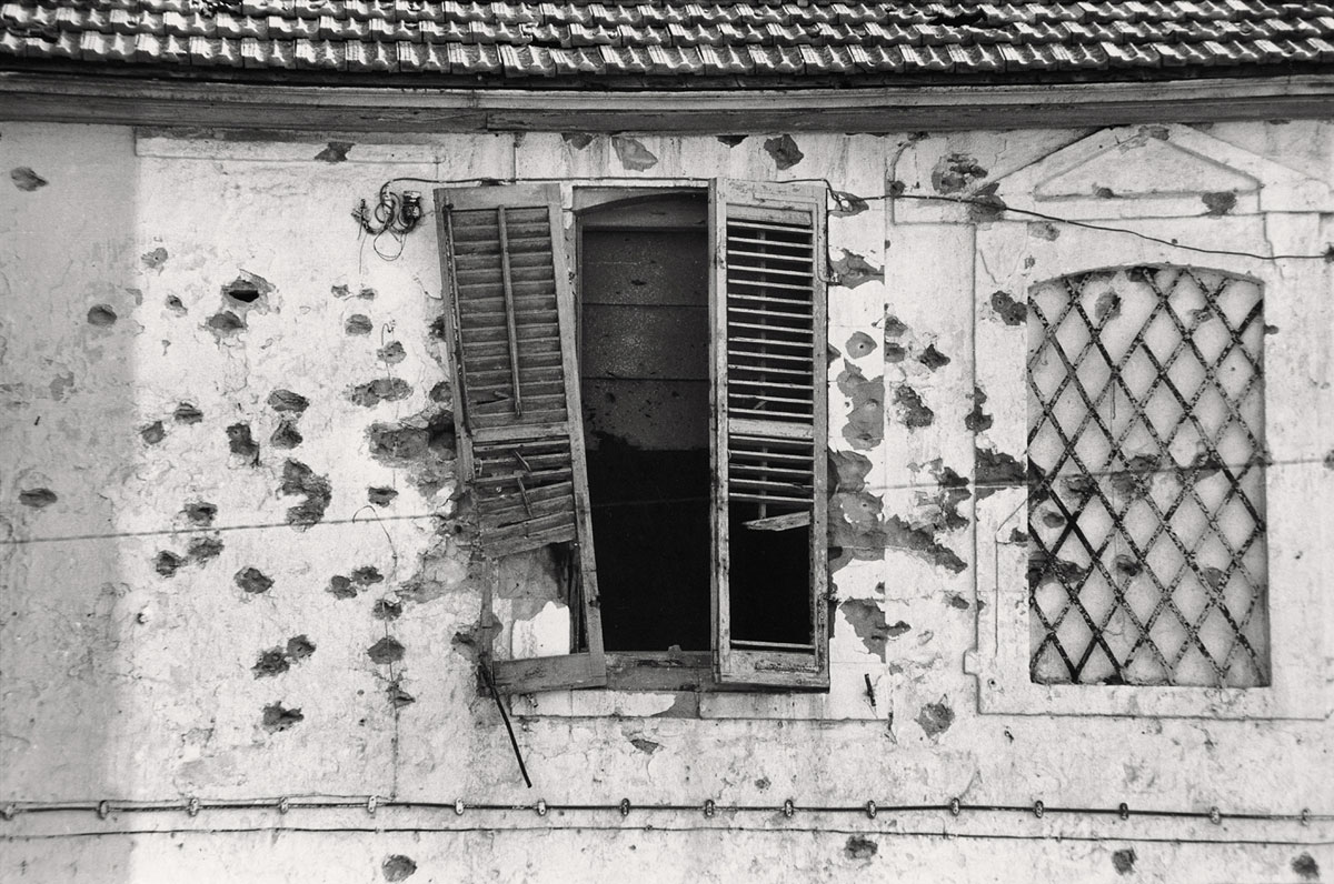 bullet-holes-in-a-facade-cyprus-1974-web (1).jpg