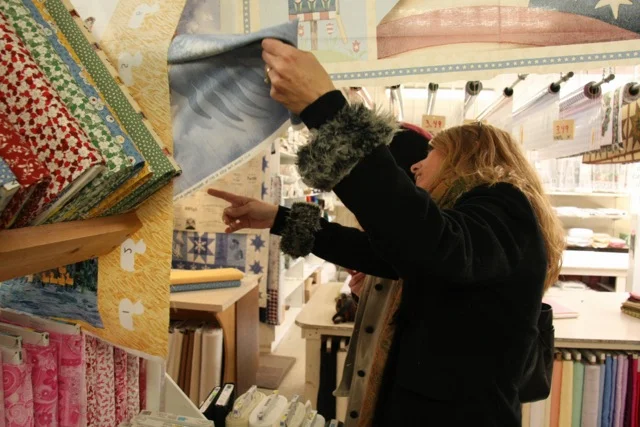 Shopping at Sauder's among the hundreds of bolts of quilters cotton. Somewhere in Pennsylvania.