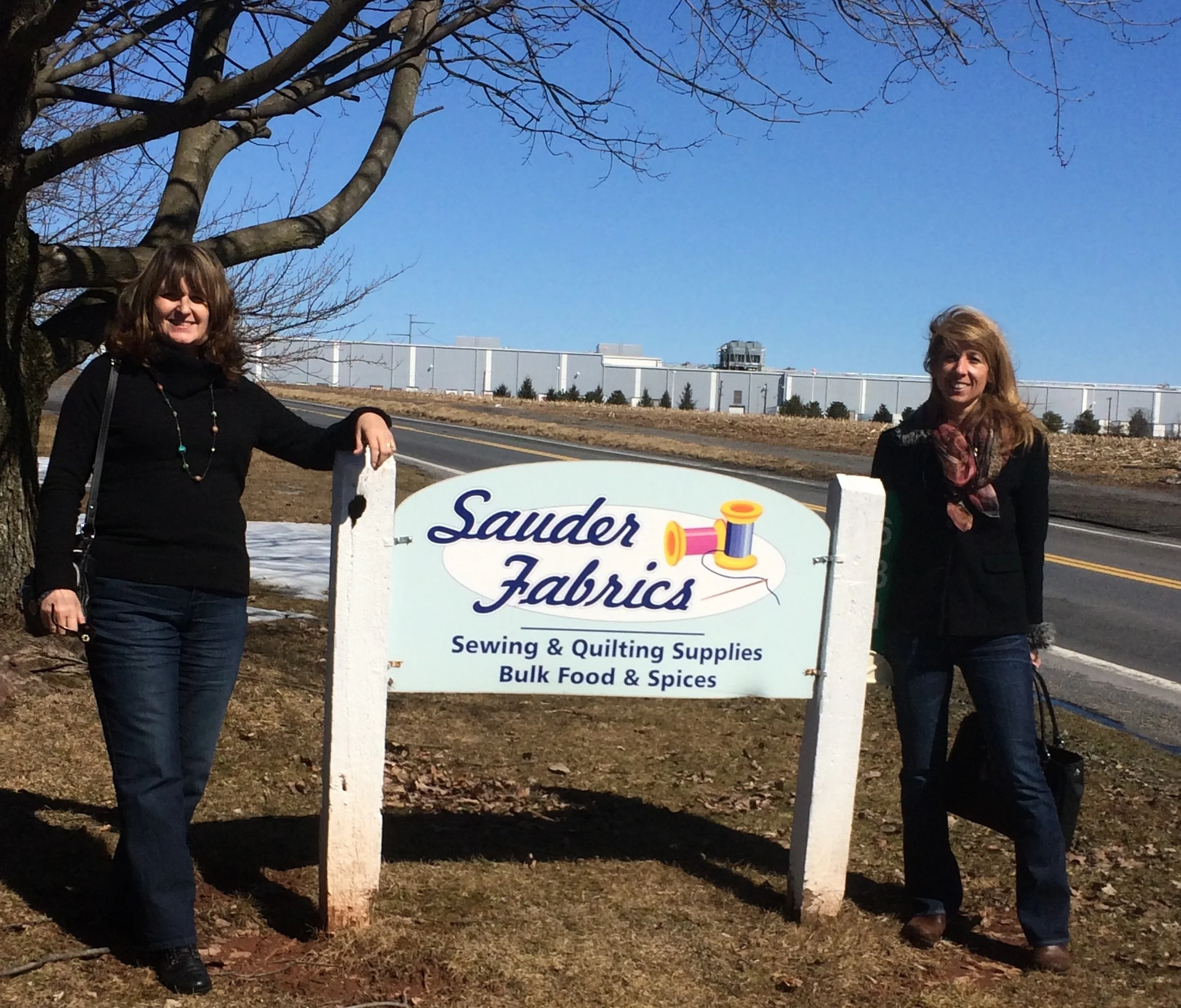 Sauders Fabrics ( somewhere near Lancaster)-Karen (left) and Me (right). It was such a windy day as we just arrived.