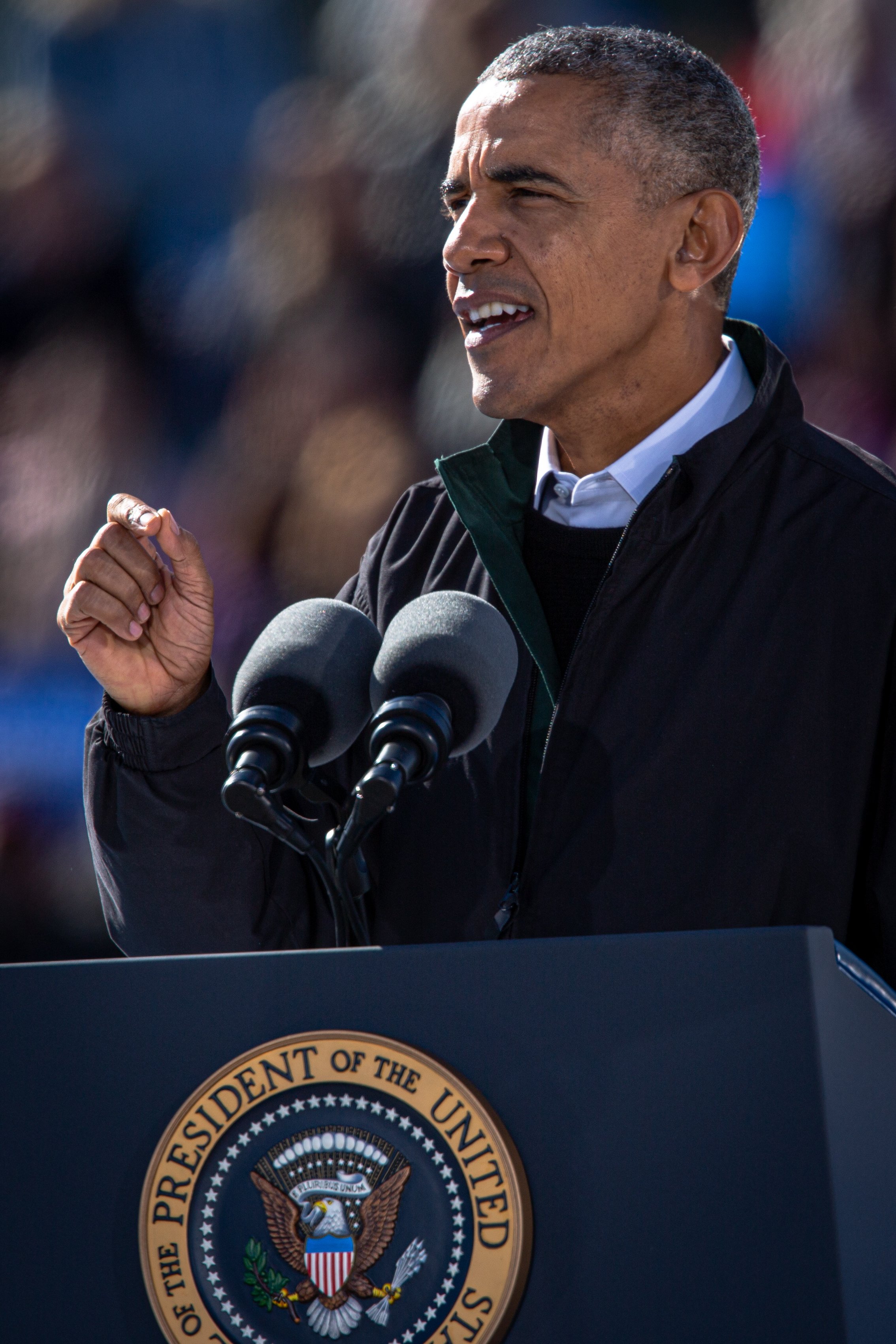  President Barack Obama speaks at a campaign rally for Democratic presidential candidate Hillary Clinton at Burke Lakefront Airport in Cleveland, Ohio on Friday, Oct. 4, 2016.  