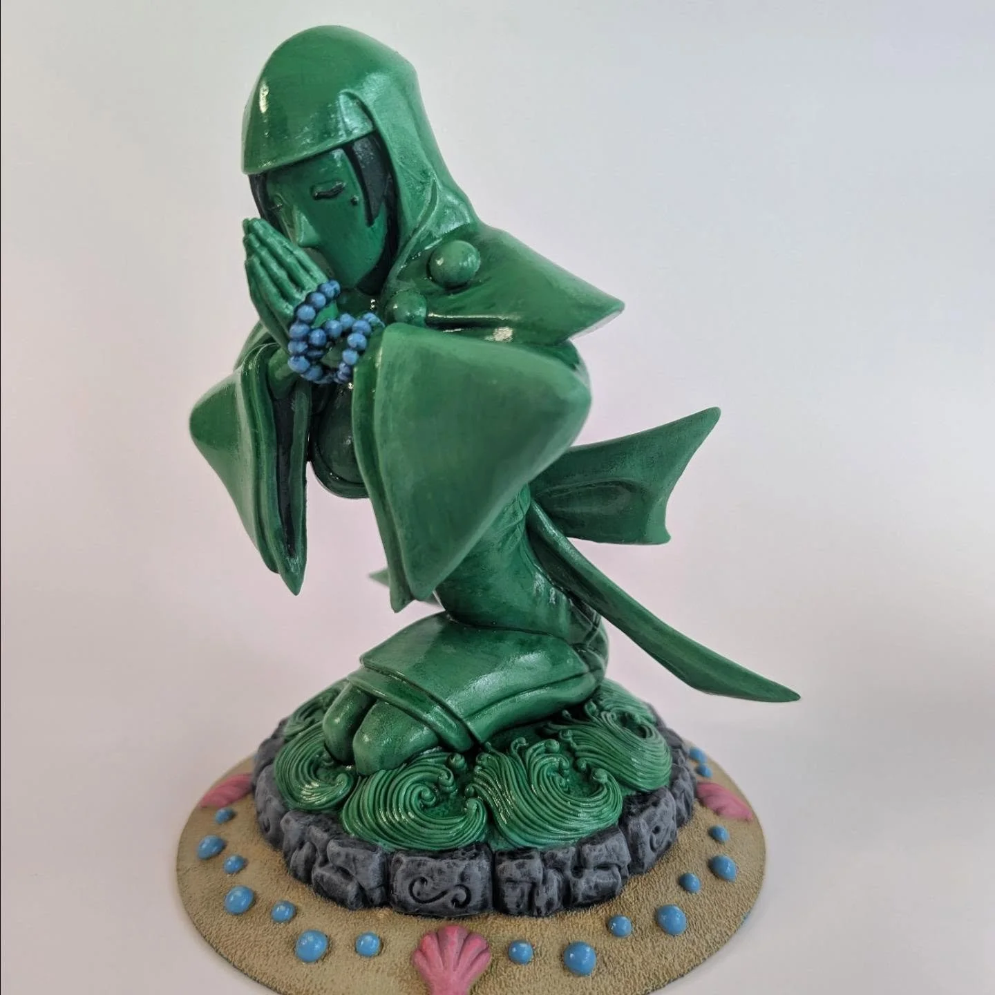 Priestess Rao from the game Okami! I had a private commission to make this 6" statuette in honor of the game's 20th anniversary last month. I was provided an illustration as a concept which I sculpted, printed, and then painted to look like Jade