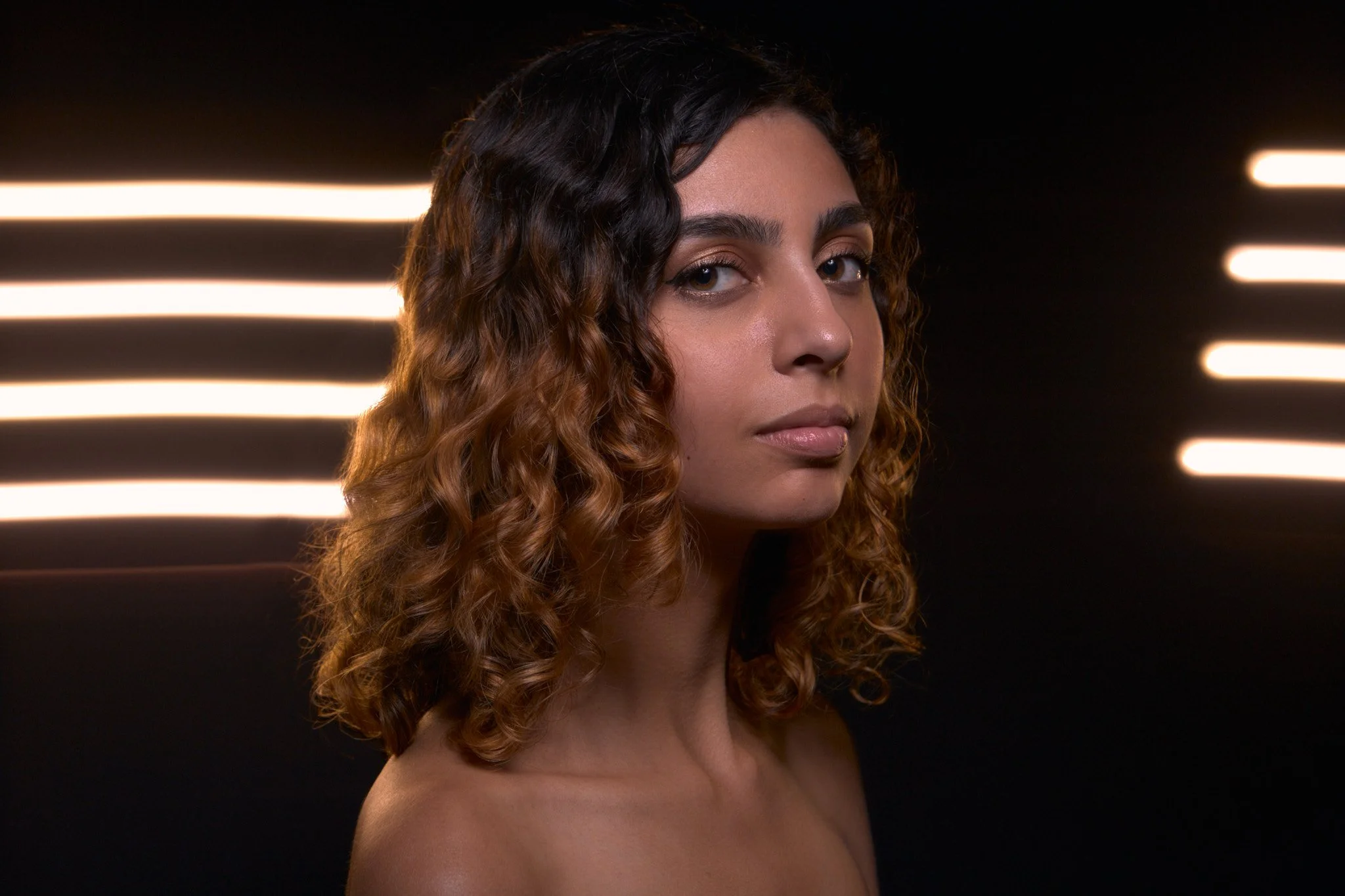 model-in-front-of-light-streaks.jpg
