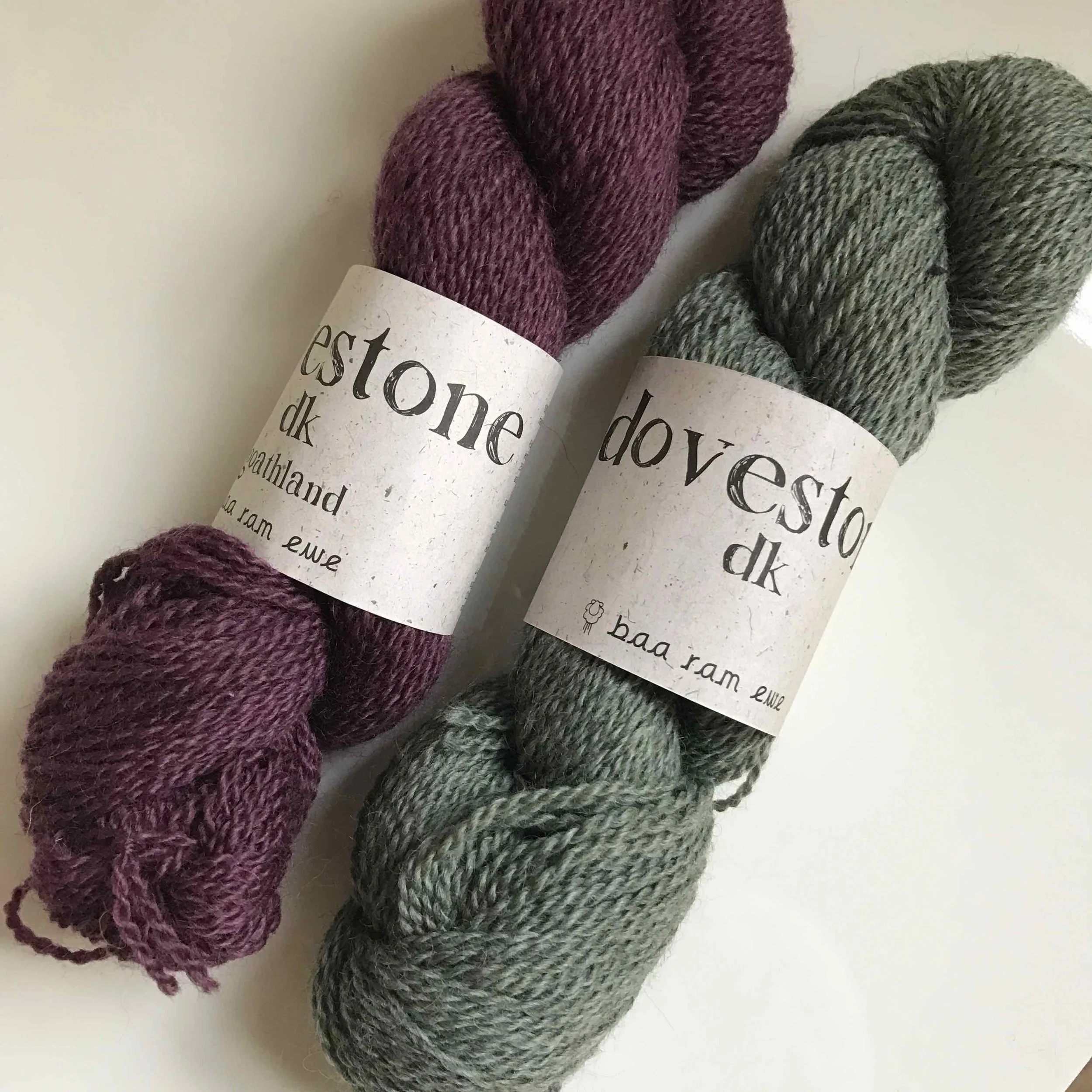 Baa Ram Ewe Dovestone DK in shades Goathland (purple) and Bramley Baths (green)
