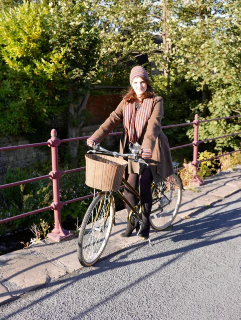 The Peloton Collection being ridden on a bicycle