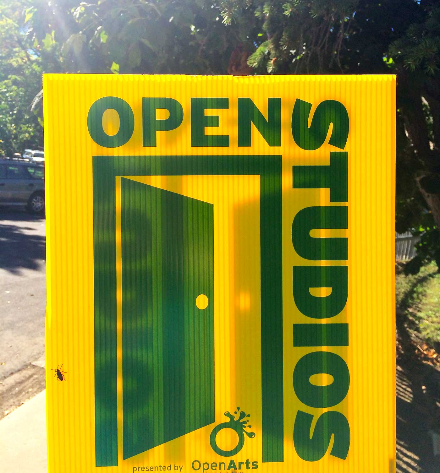 These little yellow signs are posted in front of the studios to help guide the way.