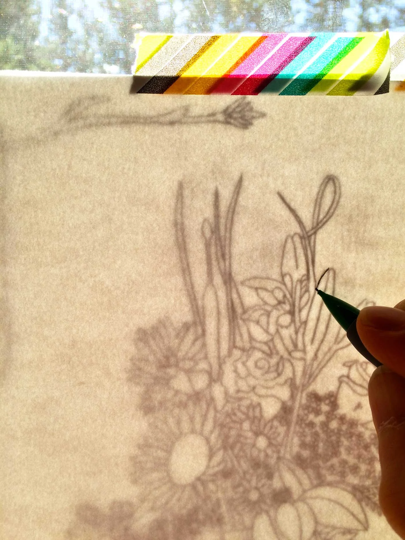 Trace over your lines with a marker or pencil. I like to use a mechanical pencil and then ink.