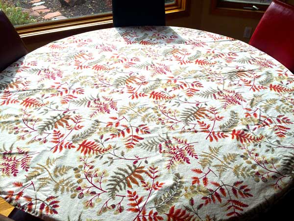 A festive tablecloth. You can opt to iron this or fluff it in the dryer but a lot of times the wrinkles just seem to flatten out as the day goes on. People still appreciate a nice table even with a few wrinkles! Don't sweat the small stuff. This is supposed to be fun.