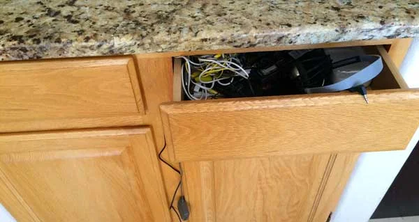 The infamous drawer. I notice whenever I have to look for something in here, I sigh. Then I quickly close the drawer. I operate by the "out of sight, out of mind" philosophy but if you think about it, you still carry around that little feeling even after you shut the drawer. This is the mini tangled wire drawer. I'll refrain from showing you the BIG tangled wire drawer.......-sigh-......again.