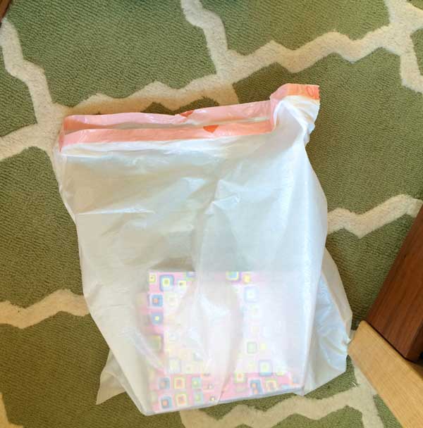 Pitch it bag at arm's reach containing non-joy sparking items ready to find a home where they will be loved and appreciated!