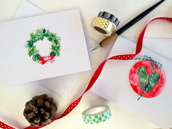 The green plaid tape at the bottom of the photo is what I like to use to affix the images to the envelopes. I love the 3-D effect it adds. Double sided tape and glue are great too. The cards are blank white cards and envelopes from the craft store (based on last week's post, you can see I really 'need' all those stationery supplies, after all (ha!). I also punched a hole in the image on the right and added twine before taping it to the card to add a little extra somethin-somethin.