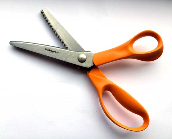 Here are the aforementioned pinking shears. You can get them at any craft/sewing shop. Many people use them to cut fabric edges to prevent fraying but they also work well for creating a cute decorative edge like the one in the above pictured gift tags.