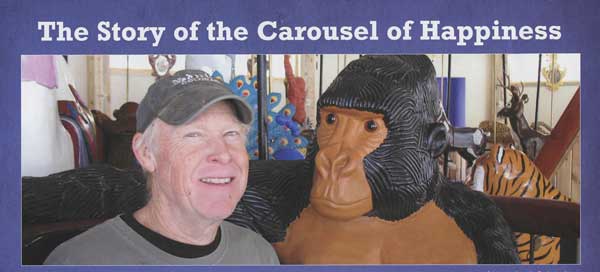 This is the man that made it all happen sitting next to one of his creations. (Photo courtesy of the Carousel of Happiness, James DeWalt, Tom Walker, and Kay Turnbaugh.)