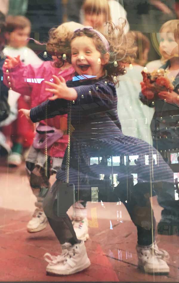 Here is the famous picture of the twirling girl that inspired the carving on the top of the carousel. (Photo courtesy of the Carousel of Happiness.)