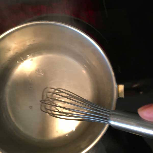 Here I am whisking. The borax has dissolved so I remove the mixture from the heat.