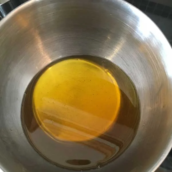 Melt the oils together and then remove from the heat to cool slightly.