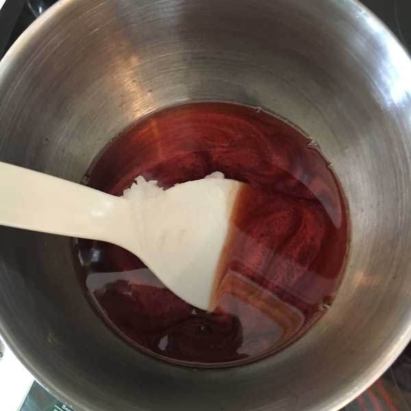 Keep stirring if you notice all the color sinking to the bottom until the mixture hardens slightly and can suspend the color.