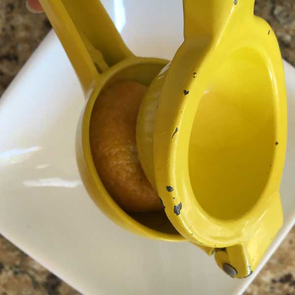 Using my handy dandy lemon juicer.