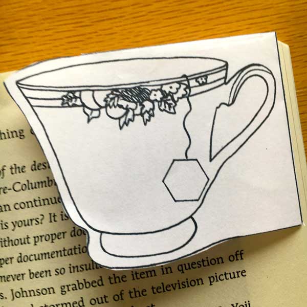 Hook the corner onto your book page and VOILA! A cute little page marker. Feel free to color and enjoy....or not....whatever makes you feel fabulous!
