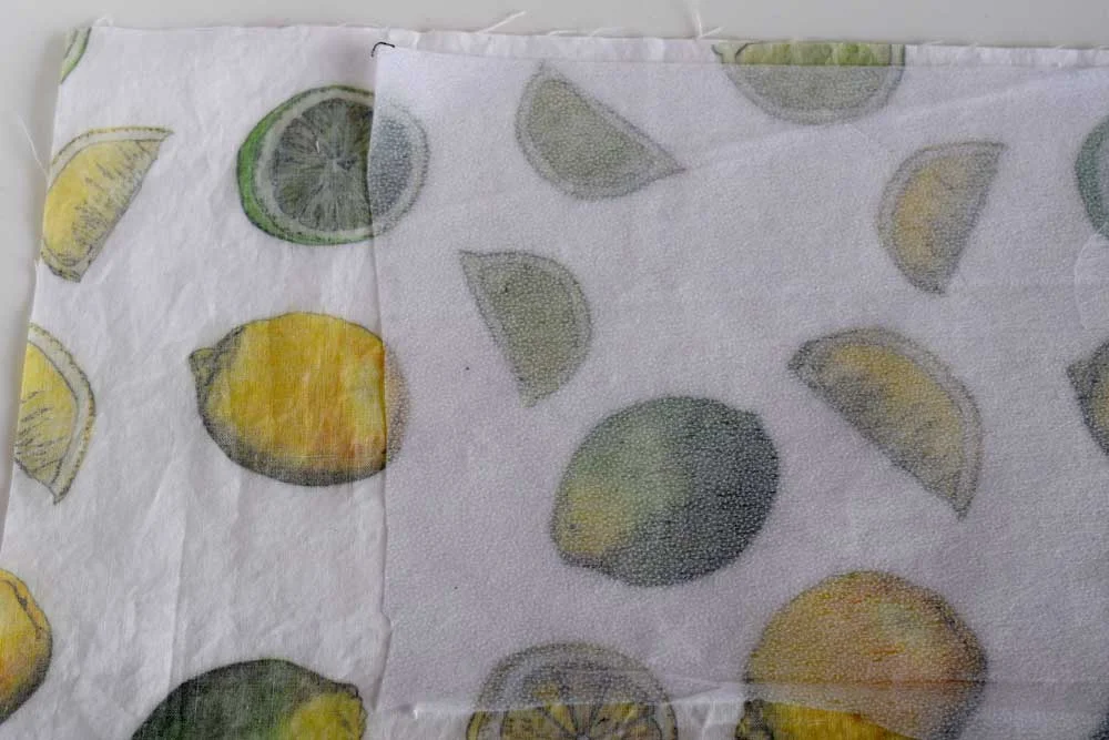 Here is the wrong side of the fabric and the interfacing lined up. Turn over and press on the fabric side (not on the interfacing side).