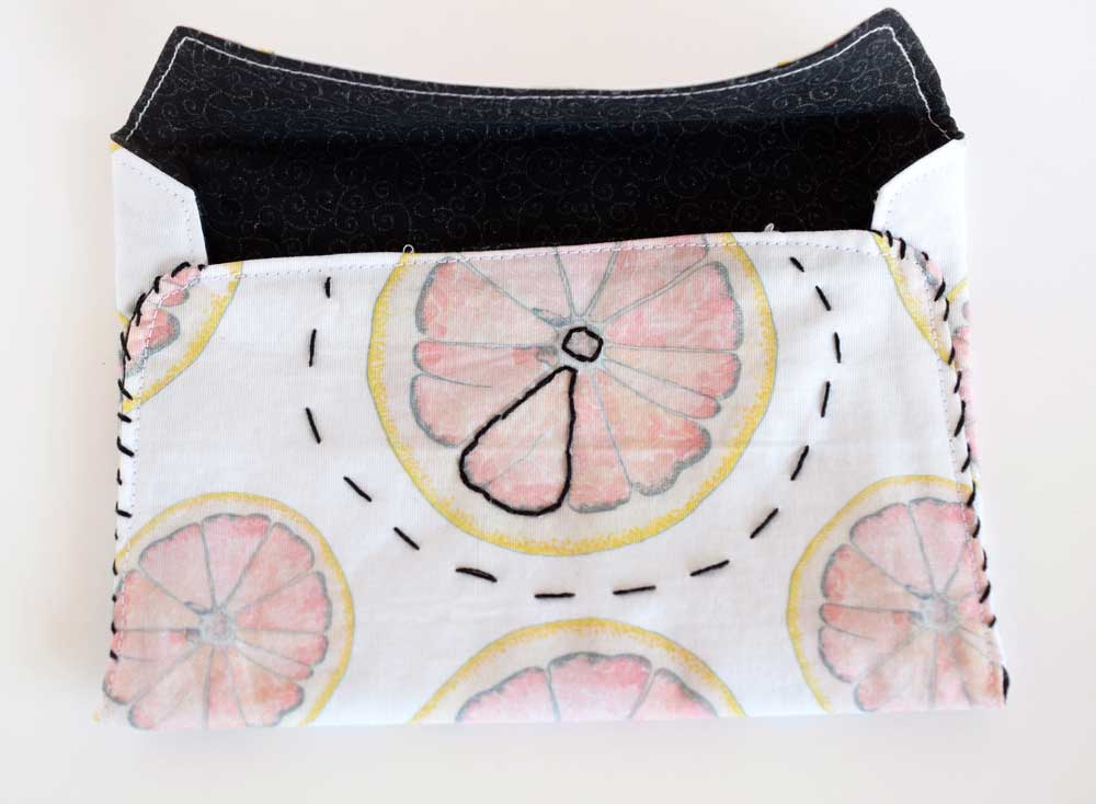 Above I use embroidery to add a punch to this very faded fabric.
