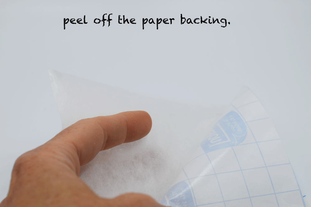 Peel the paper backing off the stabilizer.