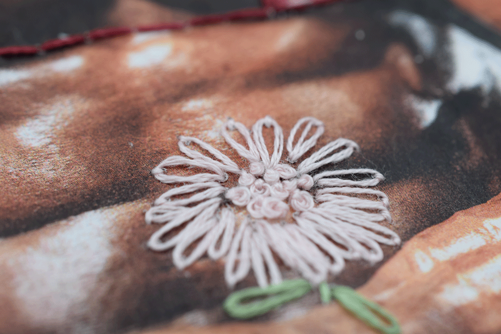 A flower using the LAZY DAISY stitch and FRENCH KNOTS !!!