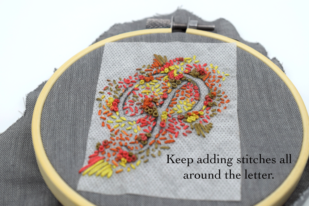 Keep adding stitches until it looks balanced all around. You can stop when the whole outline of the letter is filled in and looks balanced all around but in my classic over-doing it style, I decided to fill in all the negative space.
