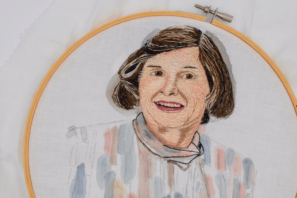 Before adding the earrings, added some embroidered highlights to the blouse but just outlining in a single thread of black.