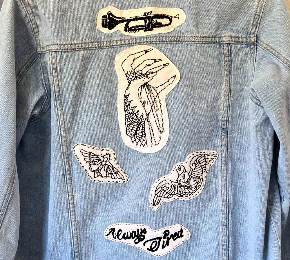 Here is the back of the jacket with the pieces attached by using a glue stick. Once the glue dried, then I sewed around the edges with my sewing machine then added a running stitch by hand. It will be an ongoing work, I’m sure.