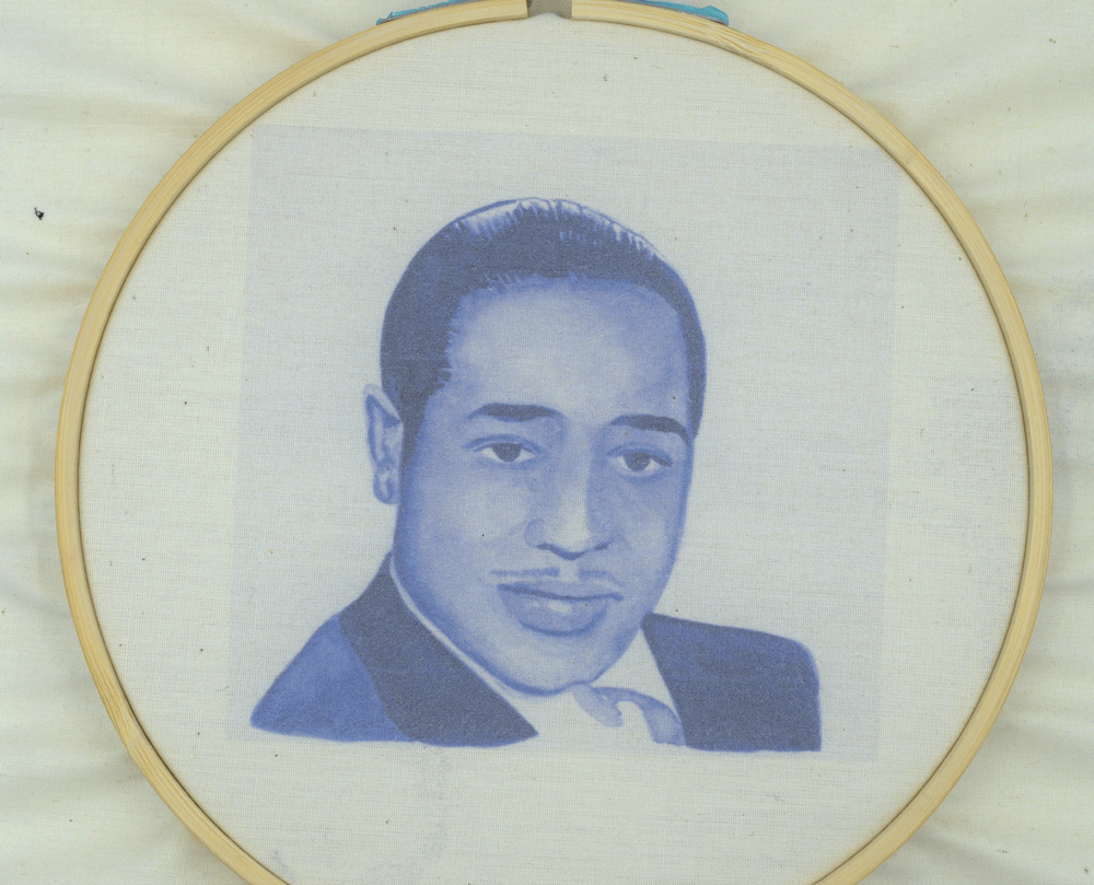 I backed the fabric with lightweight interfacing then placed the image in a wooden embroidery hoop.